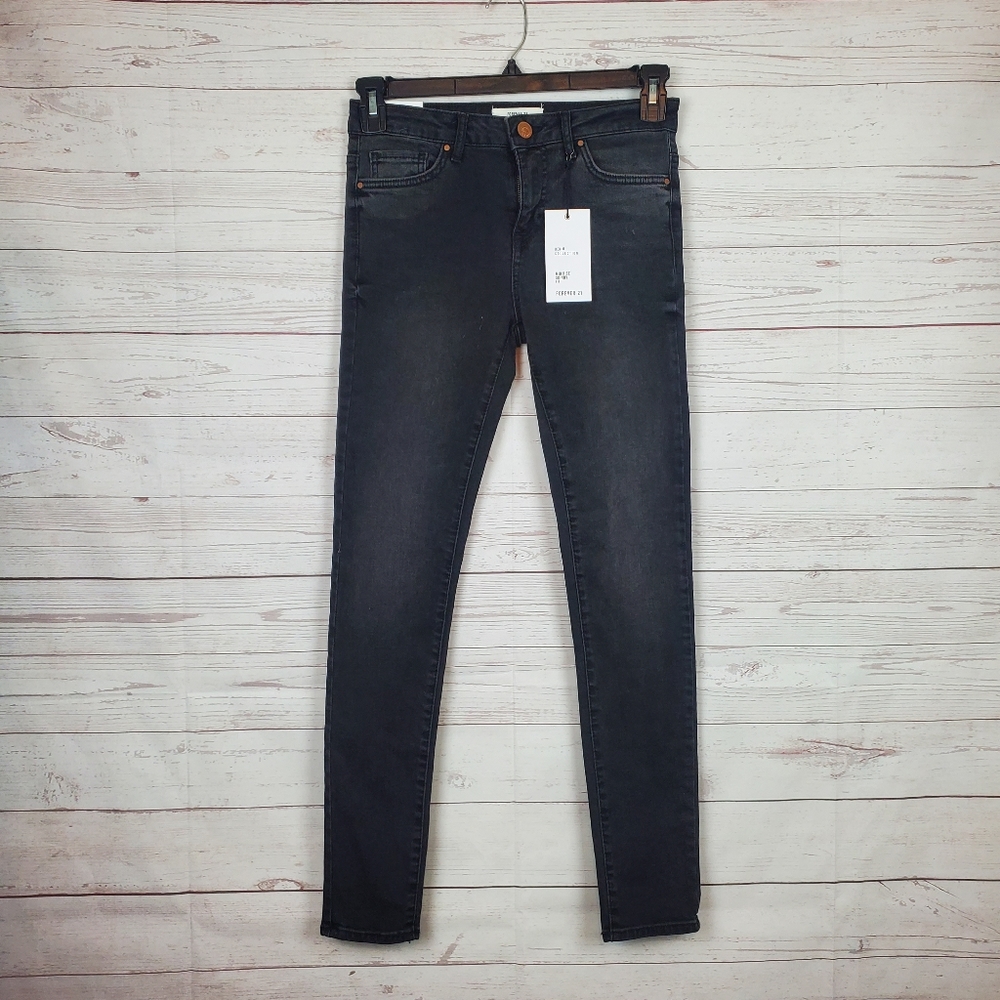 F21 black mid rise skinny jeans